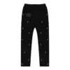 Pantalon de survêtement à œillets multiples
