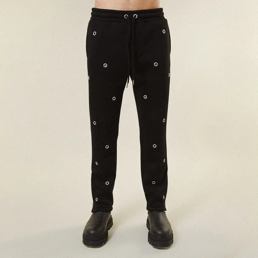 Pantalon de survêtement à œillets multiples