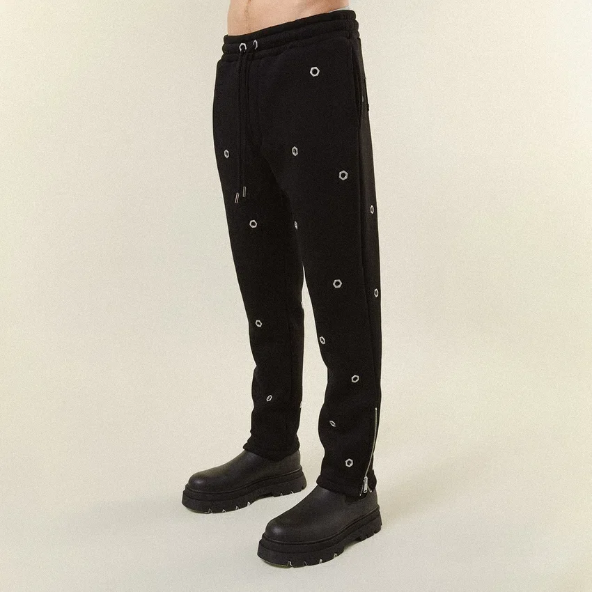 Pantalon de survêtement à œillets multiples