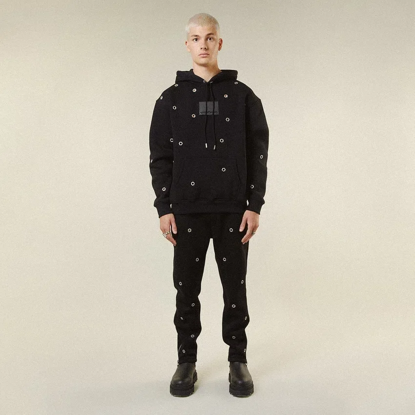 Pantalon de survêtement à œillets multiples