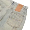 Pantalon en denim vieilli au laser
