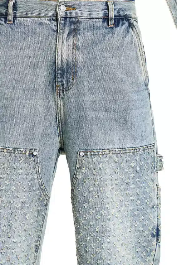 Pantalon en denim vieilli au laser