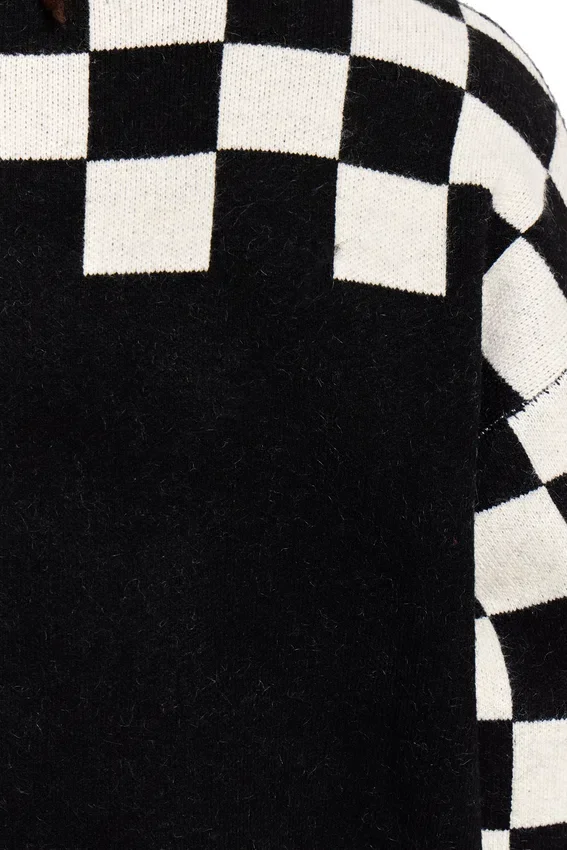 Pull à manches à carreaux