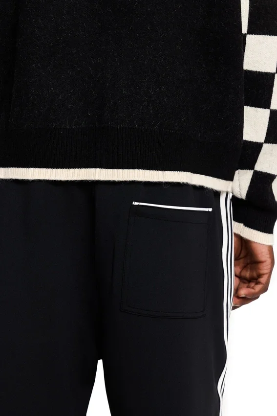 Pull à manches à carreaux